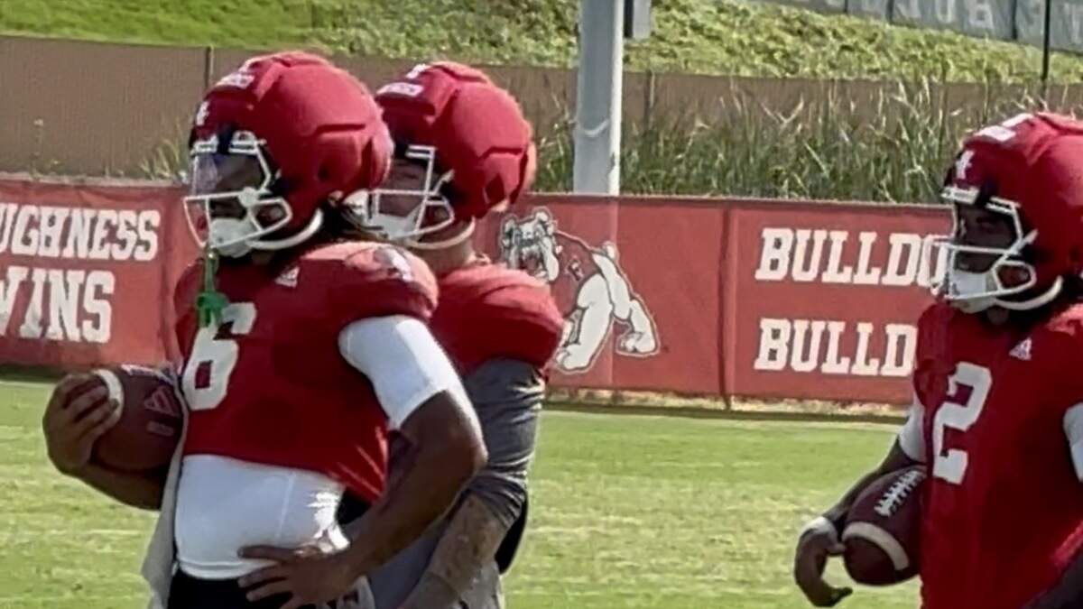 Running backs Bryson Donelson, left, and Rayshon Luke, right, looks on at Fresno State fall camp in early August.
